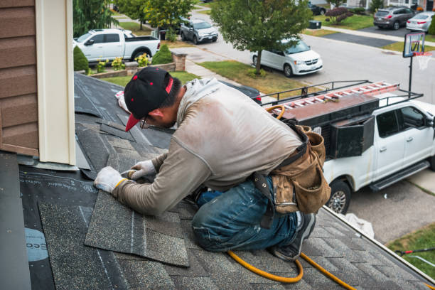 Professional Roofing technician working in South Deerfield, MA